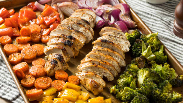 Roasted vegetables on a sheet pan with chicken
